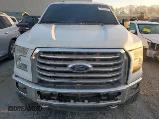 2015 Ford F-150 XLT with VIN 1FTEW1EFXFFB04685, listed as a Copart auction lot 77041514 with 161,088 mi miles and Salvage Title. Bid and sale history available at carsss.com. Image 5.