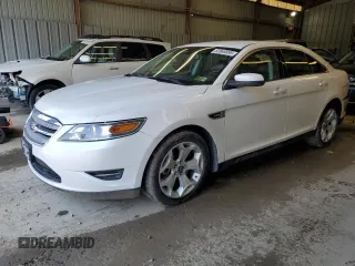 2012 Ford Taurus SEL z VIN 1FAHP2HW8CG133657, wystawiony jako Copart lot #52865895 z przebiegiem 132 876 mil mil oraz Szkoda całkowita • Salvage title. Historia ofert i sprzedaży dostępna na DreamBid. Obrazek 1.