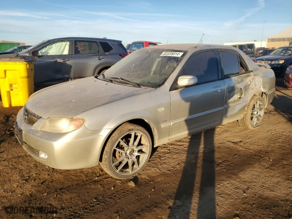 2002 Mazda Protege DX with VIN JM1BJ225420638667, listed as a Copart auction lot 83335814 with 182,368 mi miles and Salvage Title. Bid and sale history available at carsss.com. Image 1.