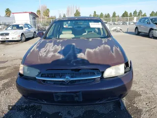 1999 Nissan Altima XE with VIN 1N4DL01D3XC209869, listed as a IAAI auction lot 41414580 with 175,076 mi miles. Bid and sale history available at carsss.com. Image 12.