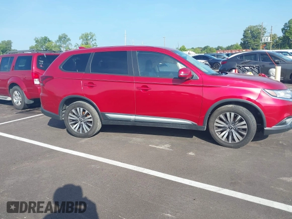 2019 Mitsubishi Outlander SE with VIN JA4AD3A31KZ026070, listed as a IAAI auction lot 42805927 with 128,569 mi miles and . Bid and sale history available at DreamBid. Image 13.