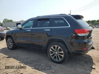 2017 Jeep Grand Cherokee Overland with VIN 1C4RJFCG9HC684850, listed as a Copart auction lot 62746974 with 0 mi miles and Salvage Title. Bid and sale history available at carsss.com. Image 2.