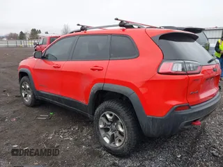 2019 Jeep Cherokee Trailhawk with VIN 1C4PJMBX4KD337408, listed as a IAAI auction lot 41788054 with 42,365 mi miles and . Bid and sale history available at DreamBid. Image 3.