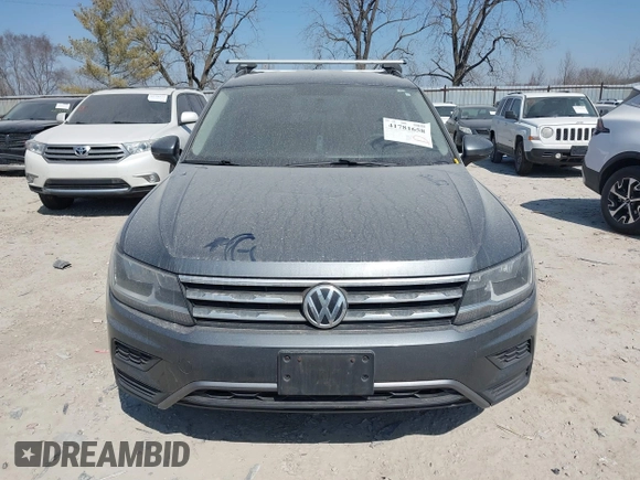 2018 Volkswagen Tiguan S with VIN 3VV0B7AX7JM104662, listed as a IAAI auction lot 41781658 with 235,461 mi miles and . Bid and sale history available at DreamBid. Image 13.