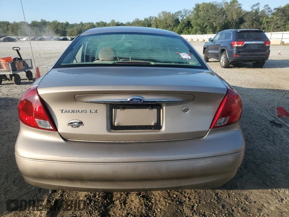 2003 Ford Taurus z VIN 1FAFP52253A170456, wystawiony jako Copart lot #70009824 z przebiegiem 216 567 mil mil oraz Szkoda całkowita • Salvage title. Historia ofert i sprzedaży dostępna na DreamBid. Obrazek 6.