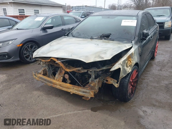 2014 Mitsubishi Lancer GT with VIN JA32U8FW9EU010127, listed as a IAAI auction lot 41182463 with Not Provided miles and . Bid and sale history available at DreamBid. Image 6.