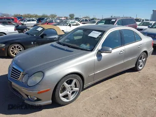 2008 Mercedes-Benz E-Class Luxury 3.5L with VIN WDBUF56X38B266614, listed as a IAAI auction lot 41652231 with 156,748 mi miles. Bid and sale history available at carsss.com. Image 2.