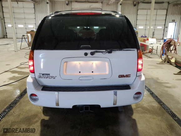2005 GMC Envoy SLE with VIN 1GKDT13S452315816, listed as a Copart auction lot 52863805 with 128,922 mi miles and Salvage Title. Bid and sale history available at carsss.com. Image 6.