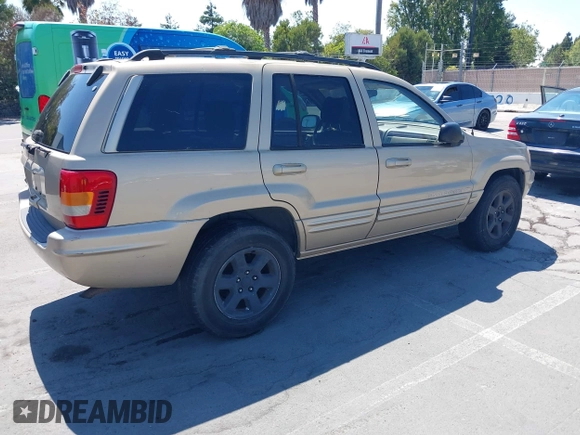 2000 Jeep Grand Cherokee Laredo z VIN 1J4G258S5YC237373, wystawiony jako IAAI lot #42736569 z przebiegiem 103 310 mil mil oraz . Historia ofert i sprzedaży dostępna na DreamBid. Obrazek 4.