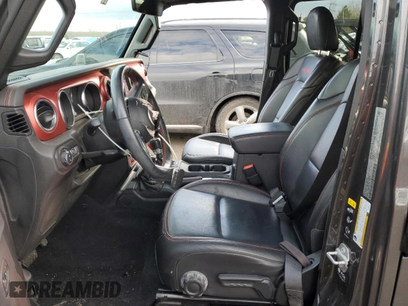 2021 Jeep Gladiator Rubicon with VIN 1C6JJTBG4ML504141, listed as a Copart auction lot 43367565 with 56,879 mi miles and Salvage title. Bid and sale history available at DreamBid. Image 7.