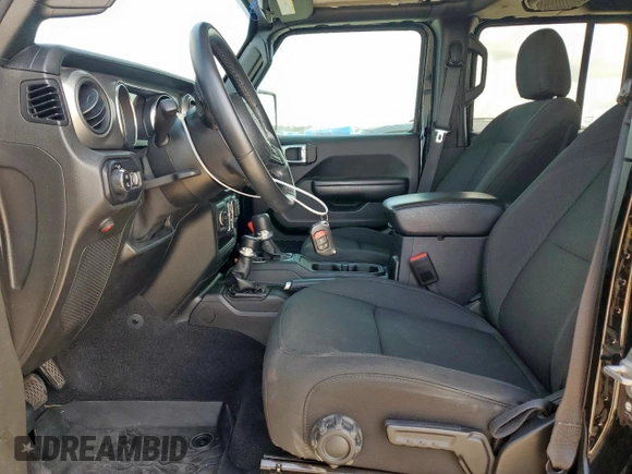 2021 Jeep Gladiator Freedom with VIN 1C6HJTAG8ML580882, listed as a Copart auction lot 57690885 with Not provided miles and Salvage title. Bid and sale history available at DreamBid. Image 7.