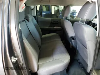 2023 Toyota Tacoma SR z VIN 3TYCZ5AN9PT173473, wystawiony jako Copart lot #54219015 z przebiegiem 22 740 mil mil oraz Szkody całkowita. Historia ofert i sprzedaży dostępna na DreamBid. Obrazek 10.