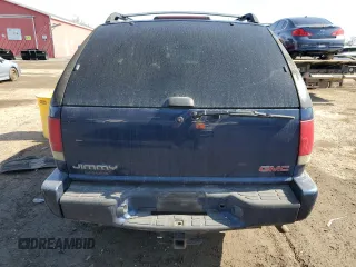 2003 GMC Jimmy z VIN 1GKCT18X43K110056, wystawiony jako Copart lot #48671585 z przebiegiem 272 867 mil mil oraz Czysty tytuł • Clean title. Historia ofert i sprzedaży dostępna na DreamBid. Obrazek 6.