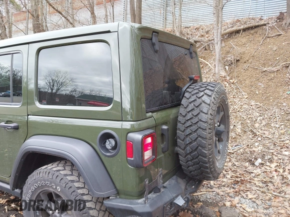 2021 Jeep Wrangler Unlimited Willys with VIN 1C4HJXDNXMW579595, listed as a IAAI auction lot 41930989 with 32,148 mi miles and . Bid and sale history available at DreamBid. Image 12.