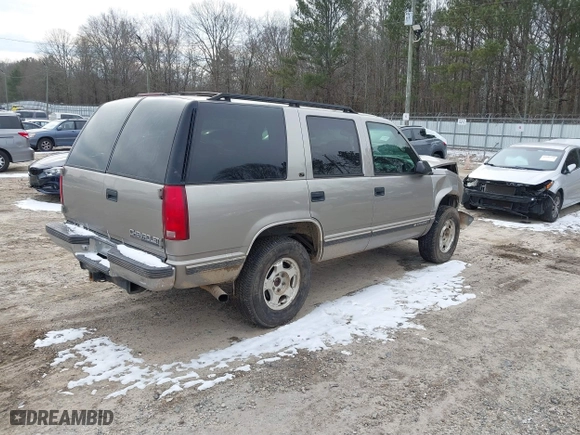 1998 Chevrolet Tahoe with VIN 1GNEK13R4WJ346417, listed as a IAAI auction lot 41390436 with 184,094 mi miles. Bid and sale history available at carsss.com. Image 4.