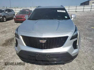 2019 Cadillac XT4 FWD Sport z VIN 1GYFZER43KF207317, wystawiony jako Copart lot #52514215 z przebiegiem 69 084 mil mil oraz Szkoda całkowita • Salvage title. Historia ofert i sprzedaży dostępna na DreamBid. Obrazek 5.