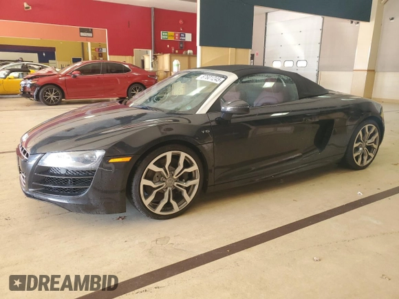 2011 Audi R8 z VIN WUATNAFG7BN002863, wystawiony jako Copart lot #87601245 z przebiegiem Nie podano mil oraz Tytuł czysty. Historia ofert i sprzedaży dostępna na DreamBid. Obrazek 1.