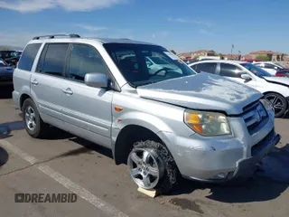 2006 Honda Pilot EX with VIN 5FNYF28436B028888, listed as a IAAI auction lot 42014594 with 219,180 mi miles and . Bid and sale history available at DreamBid. Image 1.