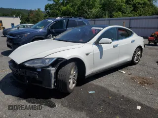 2013 Tesla Model S with VIN 5YJSA1DN0DFP18592, listed as a Copart auction lot 62151505 with 192,283 mi miles and Salvage title. Bid and sale history available at DreamBid. Image 1.