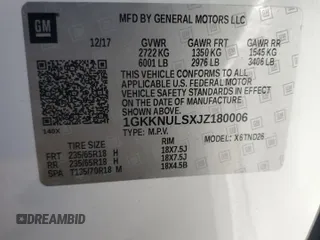 2018 GMC Acadia SLT z VIN 1GKKNULSXJZ180006, wystawiony jako Copart lot #54325255 z przebiegiem 99 033 mil mil oraz Szkoda całkowita • Salvage title. Historia ofert i sprzedaży dostępna na DreamBid. Obrazek 14.