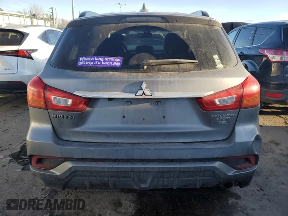 2018 Mitsubishi Outlander SEL z VIN JA4AR4AW3JU002172, wystawiony jako Copart lot #88219955 z przebiegiem 95 339 mil mil oraz Szkody całkowita. Historia ofert i sprzedaży dostępna na DreamBid. Obrazek 6.
