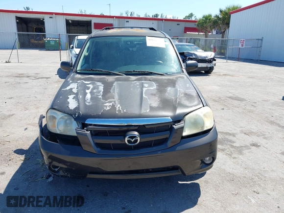 2006 Mazda Tribute i with VIN 4F2YZ02Z36KM29148, listed as a IAAI auction lot 42044163 with 175,786 mi miles and . Bid and sale history available at carsss.com. Image 12.
