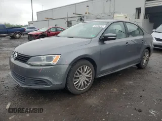 2012 Volkswagen Jetta SE with VIN 3VWDX7AJ0CM408784, listed as a Copart auction lot 56673235 with 203,203 mi miles and Salvage title. Bid and sale history available at DreamBid. Image 1.