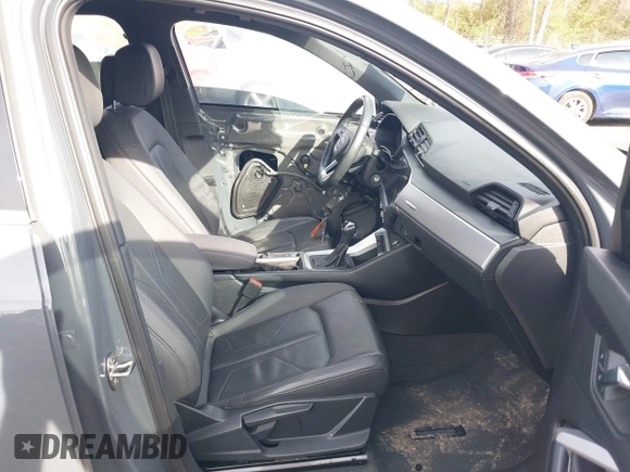 2019 Audi Q3 Premium with VIN WA1AECF37K1076492, listed as a IAAI auction lot 41099499 with 80,975 mi miles and . Bid and sale history available at DreamBid. Image 5.