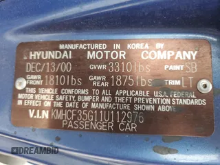 2001 Hyundai Accent z VIN KMHCF35G11U112976, wystawiony jako Copart lot #68692384 z przebiegiem 152 797 mil mil oraz Szkoda całkowita • Salvage title. Historia ofert i sprzedaży dostępna na DreamBid. Obrazek 12.