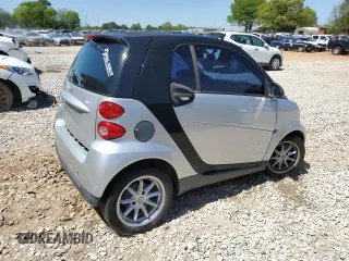 2009 Smart fortwo Pure with VIN WMEEJ31X49K224990, listed as a Copart auction lot 52111335 with 72,317 mi miles and Salvage Title. Bid and sale history available at carsss.com. Image 3.