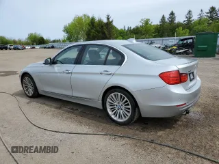2013 BMW 3 Series 328i xDrive with VIN WBA3B3C5XDF531142, listed as a Copart auction lot 58651745 with 209,990 mi miles and Clean title. Bid and sale history available at DreamBid. Image 2.