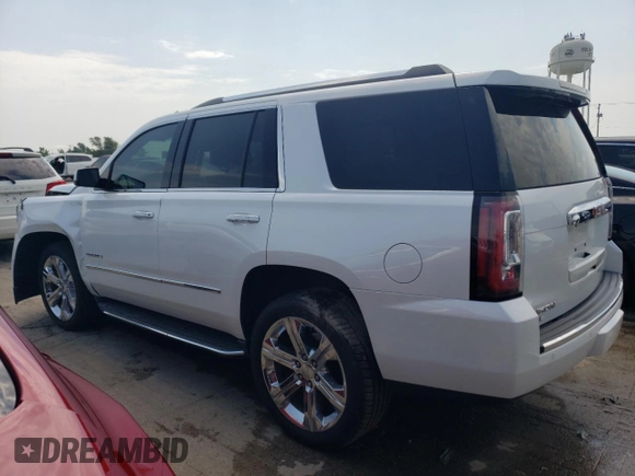 2016 GMC Yukon Denali with VIN 1GKS2CKJ3GR391360, listed as a Copart auction lot 65940114 with 51,040 mi miles and Salvage Title. Bid and sale history available at carsss.com. Image 2.