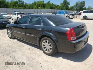 2009 Chrysler 300 with VIN 2C3KA63T39H580730, listed as a Copart auction lot 64933564 with 155,403 mi miles and Salvage Title. Bid and sale history available at carsss.com. Image 2.