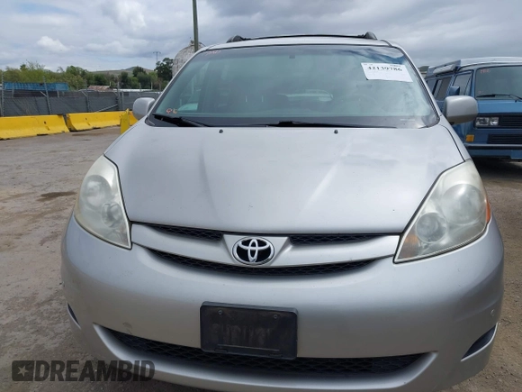 2009 Toyota Sienna XLE with VIN 5TDBK22C89S022909, listed as a IAAI auction lot 42139786 with 107,247 mi miles and . Bid and sale history available at DreamBid. Image 6.