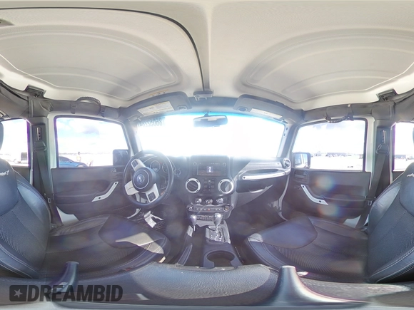 2015 Jeep Wrangler Unlimited Sahara with VIN 1C4BJWEG6FL614671, listed as a Copart auction lot 86052284 with 92,894 mi miles and Salvage title. Bid and sale history available at DreamBid. Image 14.