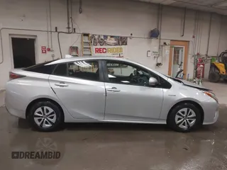 2017 Toyota Prius Two z VIN JTDKARFU1H3037959, wystawiony jako IAAI lot #41509021 z przebiegiem 82 500 mil mil oraz . Historia ofert i sprzedaży dostępna na DreamBid. Obrazek 14.
