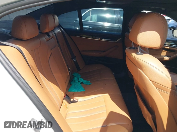 2018 BMW 5 Series 530i with VIN WBAJA5C5XJWA39179, listed as a IAAI auction lot 42380945 with 76,410 mi miles and . Bid and sale history available at DreamBid. Image 8.
