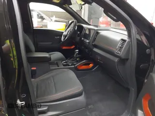 2022 Nissan Frontier SV z VIN 1N6ED1EJ5NN627303, wystawiony jako IAAI lot #41665799 z przebiegiem 59 462 mil mil oraz . Historia ofert i sprzedaży dostępna na DreamBid. Obrazek 5.