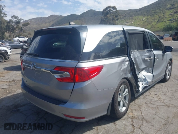 2020 Honda Odyssey EX-L with VIN 5FNRL6H7XLB017154, listed as a IAAI auction lot 41698872 with 54,626 mi miles. Bid and sale history available at carsss.com. Image 4.