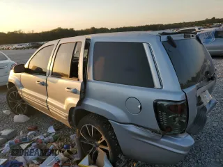 2004 Jeep Grand Cherokee with VIN 1J8GX58J54C284761, listed as a Copart auction lot 75614854 with 182,188 mi miles and Salvage title. Bid and sale history available at DreamBid. Image 2.