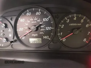 2000 Mazda Protege DX with VIN JM1BJ2226Y0206340, listed as a IAAI auction lot 41645396 with 238,500 mi miles and . Bid and sale history available at DreamBid. Image 7.