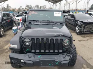 2021 Jeep Wrangler Sport with VIN 1C4GJXAN5MW627228, listed as a IAAI auction lot 42170010 with 56,965 mi miles and . Bid and sale history available at DreamBid. Image 12.