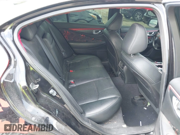2015 Infiniti Q50 Premium z VIN JN1BV7AR8FM398319, wystawiony jako IAAI lot #42170789 z przebiegiem 86 108 mil mil oraz . Historia ofert i sprzedaży dostępna na DreamBid. Obrazek 8.