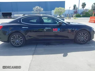 2019 Maserati Ghibli with VIN ZAM57XSA5K1328183, listed as a IAAI auction lot 41970101 with 61,260 mi miles. Bid and sale history available at carsss.com. Image 13.