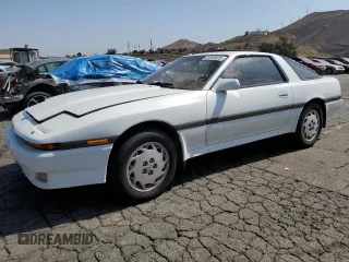 1987 Toyota Supra with VIN JT2MA70L2H0047911, listed as a Copart auction lot 61289925 with 24,104 mi miles and Clean title. Bid and sale history available at DreamBid. Image 1.