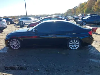2013 BMW 3 Series 328i with VIN WBA3A5G5XDNP25605, listed as a IAAI auction lot 40854040 with 155,511 mi miles. Bid and sale history available at carsss.com. Image 14.