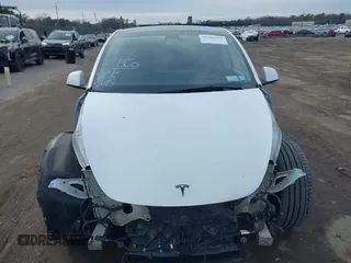 2021 Tesla Model Y Performance with VIN 5YJYGDEF1MF262930, listed as a IAAI auction lot 41606321 with 28,882 mi miles and . Bid and sale history available at DreamBid. Image 12.