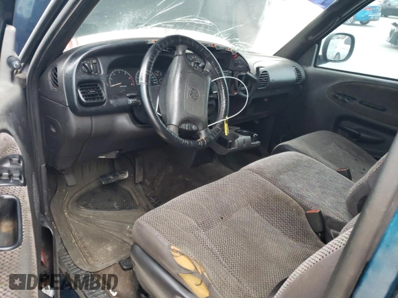 2001 Dodge 1500 z VIN 1B7HC13Y61J292282, wystawiony jako Copart lot #51699925 z przebiegiem 301 160 mil mil oraz Szkoda całkowita • Salvage title. Historia ofert i sprzedaży dostępna na DreamBid. Obrazek 8.
