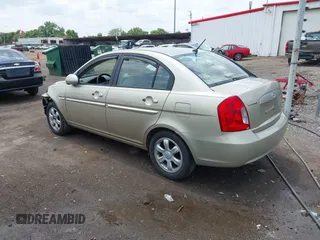 2006 Hyundai Accent GLS with VIN KMHCN46C26U037605, listed as a IAAI auction lot 42431996 with 86,128 mi miles and . Bid and sale history available at DreamBid. Image 3.