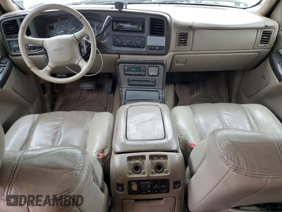 2002 GMC Yukon Denali z VIN 1GKEK63U82J224913, wystawiony jako Copart lot #60664885 z przebiegiem 208 794 mil mil oraz Szkoda całkowita • Salvage title. Historia ofert i sprzedaży dostępna na DreamBid. Obrazek 8.